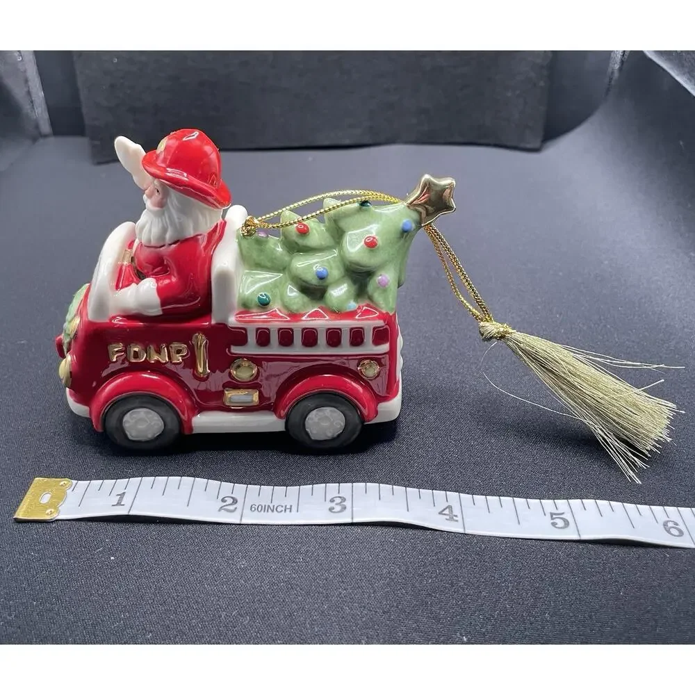 Lenox Santa in Fire Truck Christmas Ornament. Porcelain New Opened For Pics Only